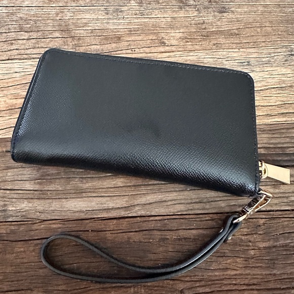 Michael Kors Black Leather Wristlet with Signature Gold Accents - Picture 2 of 7